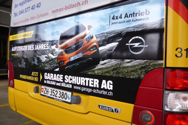 Bus-Heckscheiben-Werbung für Garage Schurter AG